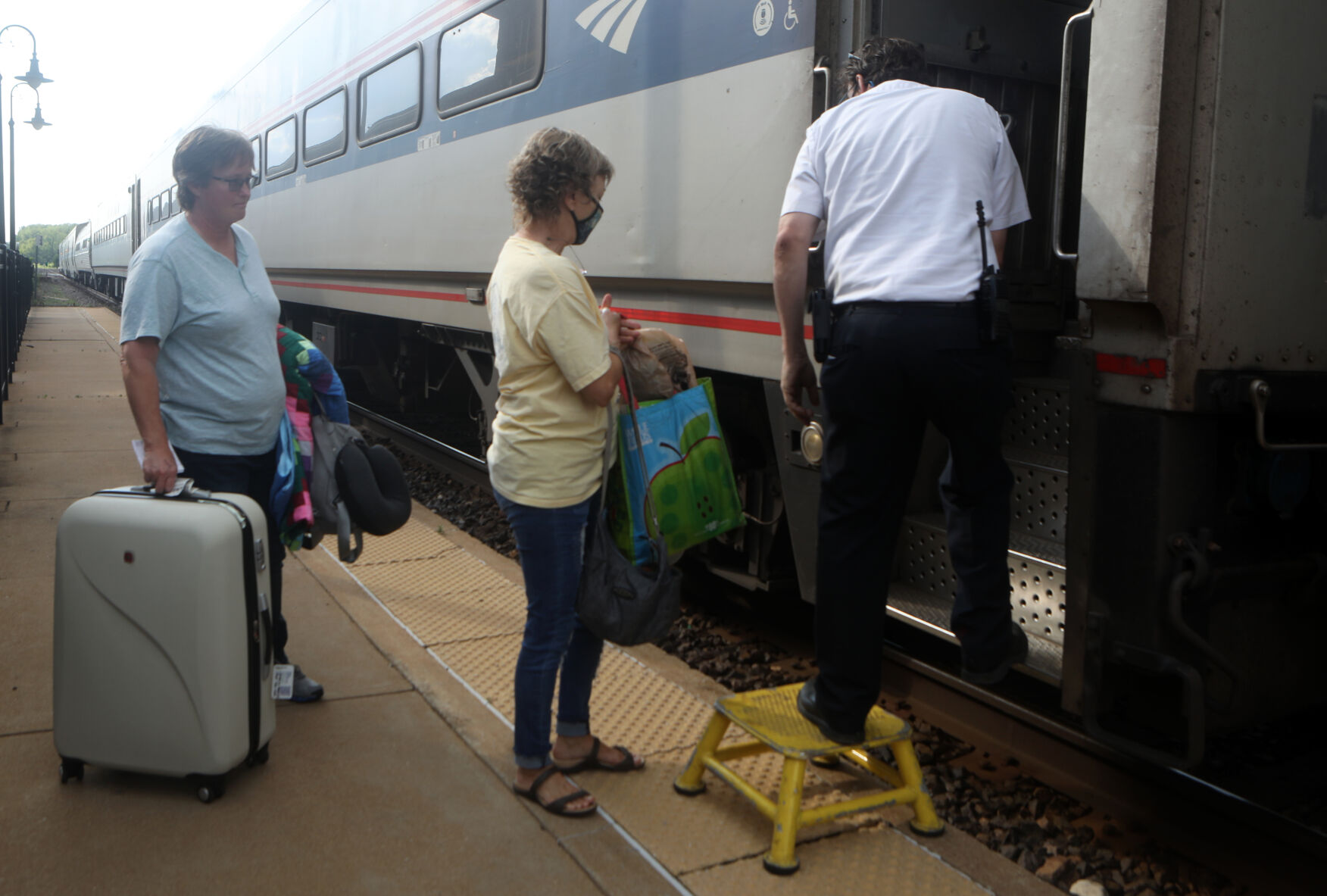 Jenny Harris boards Amtrak